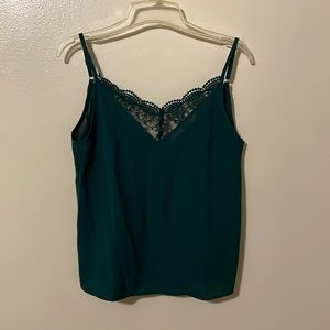 Brand new tank top with a low back.